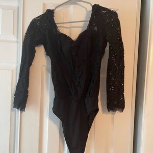 Black lace body suit